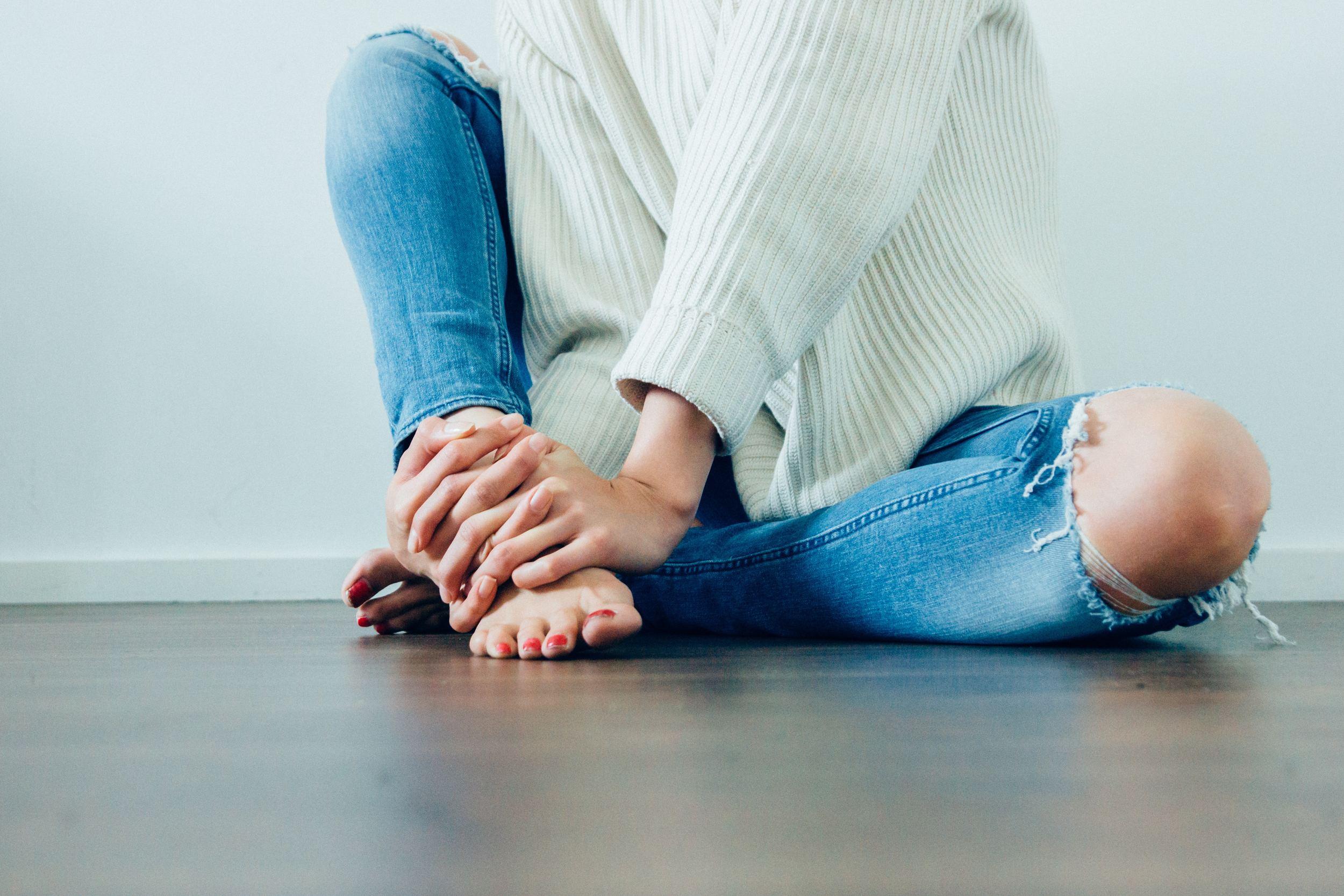 Woman in Jeans On Floor
