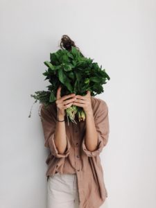 Woman Holding Green Vegetables